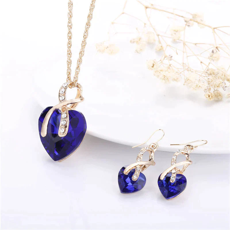 Set Ketting + Oorbellen van Liefde met Blauwe Zirkonia in Goud