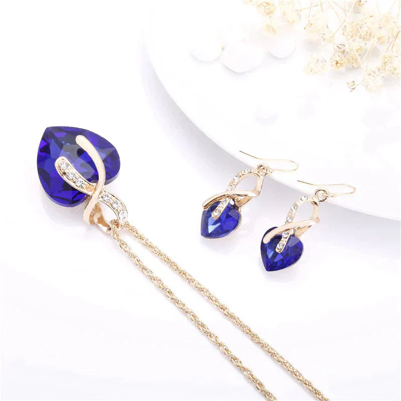 Set Ketting + Oorbellen van Liefde met Blauwe Zirkonia in Goud